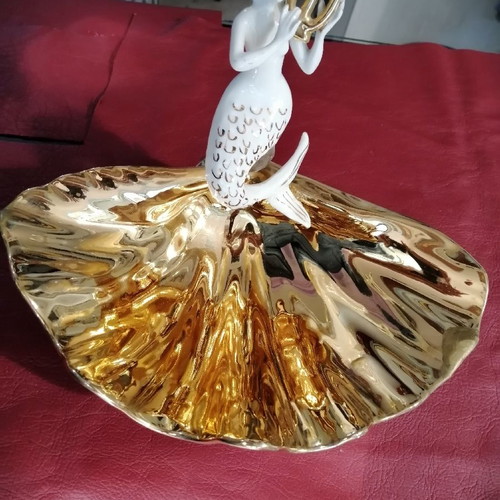 Mermaid and clam used, gold and porcelain decoration