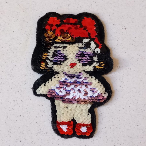 Iron-on patch used with movable sequins