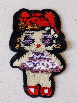 Iron-on patch used with movable sequins