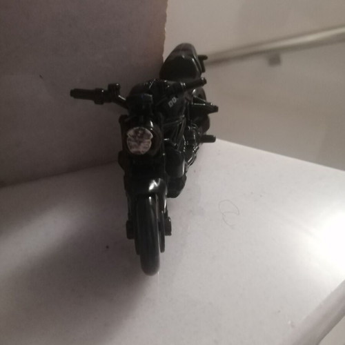 Ducati plastic motorcycle used, does not stand upright