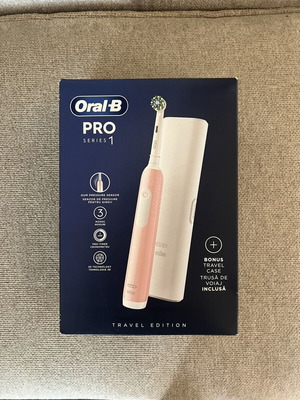 Oral-B Pro Series 1 electric toothbrush, pink, travel edition