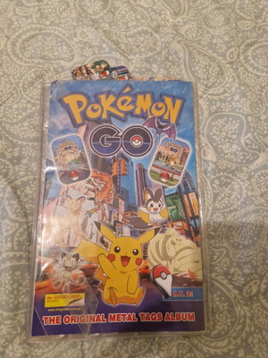 Pokemon metal tags album