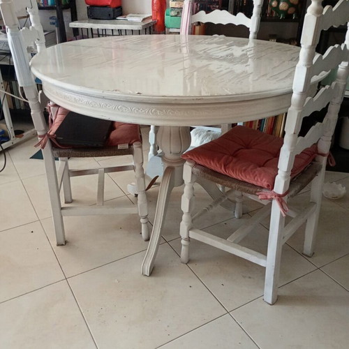 Vintage round dining table with 3 wooden chairs and rattan seats