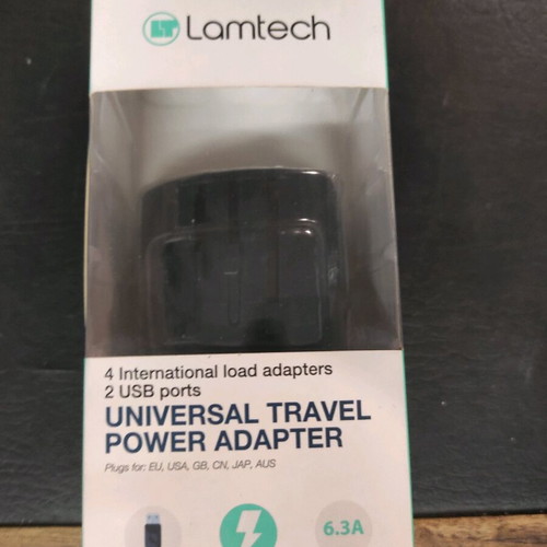 Universal travel power adapter Lamtech new with 2 extra USB ports