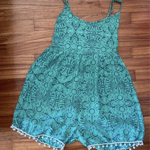 Jumpsuit green with white tassels and adjustable straps like new