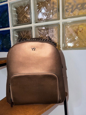 Y Not? Backpack like new, bronze color
