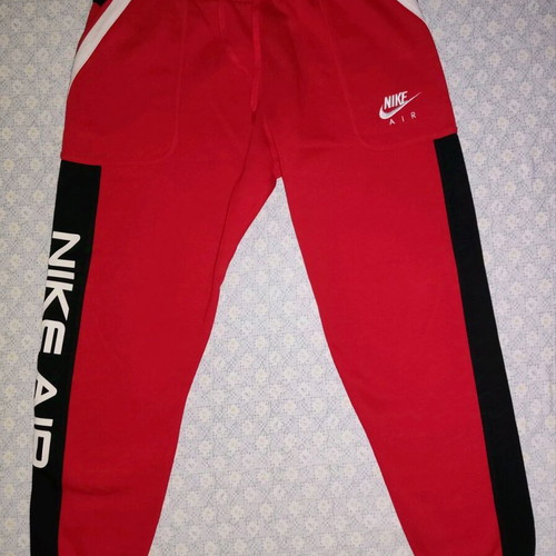Nike sweatpants like new, red with black details, size M
