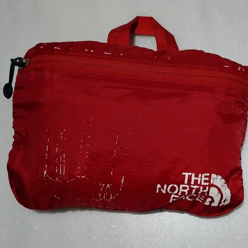 Northface red backpack used, waterproof with 4 compartments