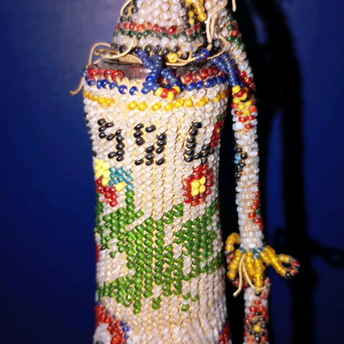 Bottle used with beads and 1924 decoration