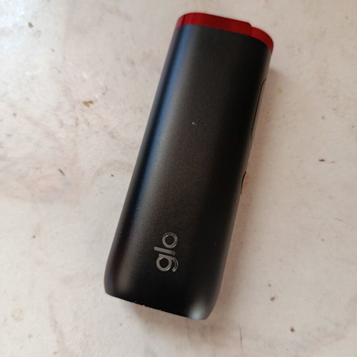 Glo smoking device used with 3 tobacco stick gift