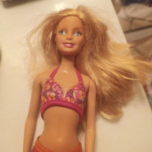Barbie doll used with minor imperfections, authentic outfit