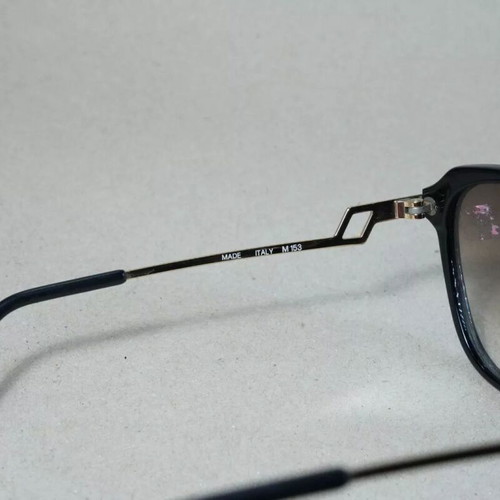 Italian Luxottica 8589 sunglasses used, black and brown
