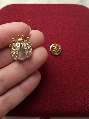 Vintage ladybug brooch with gold tone and rhinestones like new