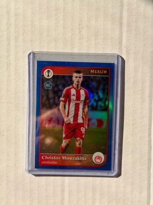 Christos Mouzakitis 2024-25 Topps Merlin UCC Blue Refractor RC #134 Olympiacos καινούργιο