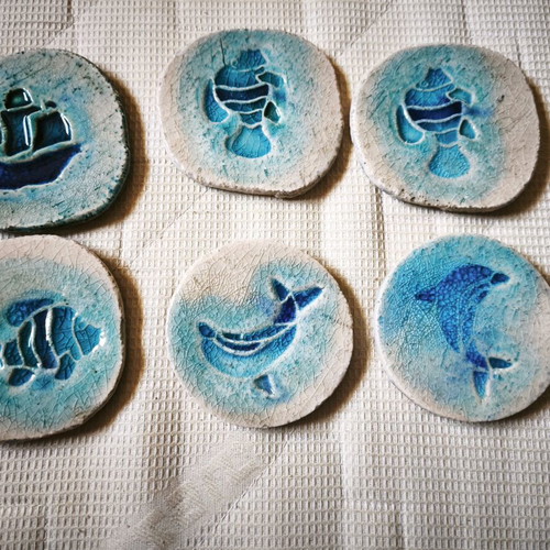 Ceramic coasters with enamel, like new, set of 6 with sea motif