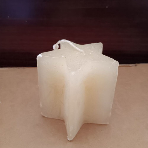 Star-shaped candle used, good condition