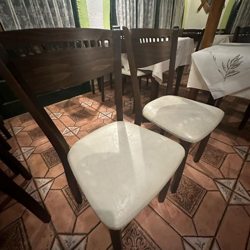Wooden chair used with beige leather seat dark brown