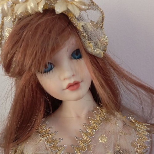 Porcelain fairy angel doll with D Paul 1990 mark