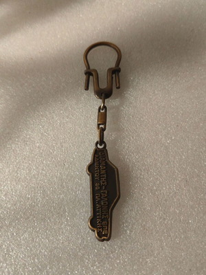 Vintage keychain used, good condition