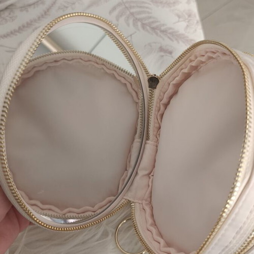 Gaultier Divine round vanity case, cream