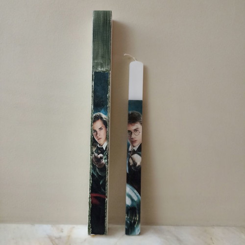 Decorated candle with Harry Potter theme and box
