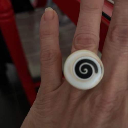 Women's white ring with painted Spira like new