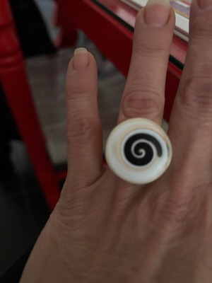 Women's white ring with painted Spira like new