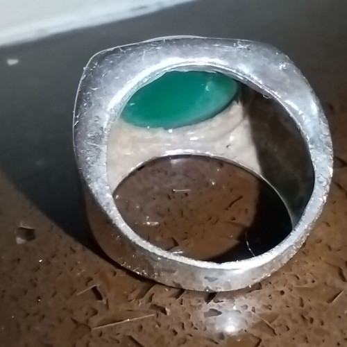 Sterling silver ring with green onyx cabochon used