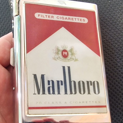 Marlboro collectible metal cigarette case with built-in lighter, like new