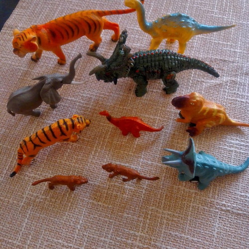 Set of dinosaur and wild animal figures like new