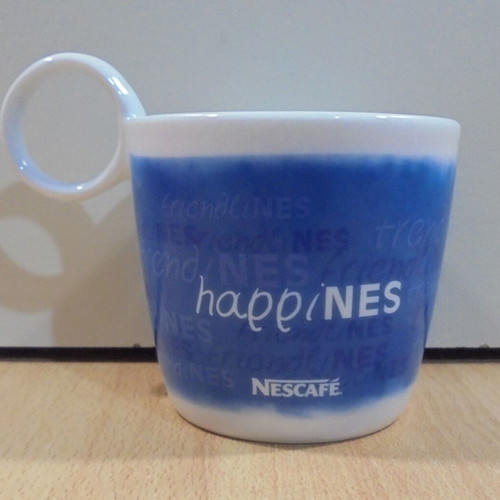 Nescafe Happines promotional porcelain mug used