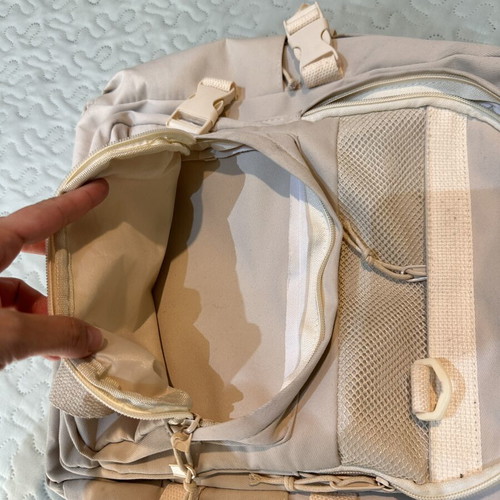 Beige travel bag backpack, used