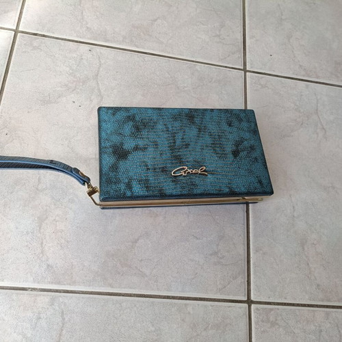 Axel wrist bag like new, blue