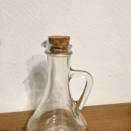 Glass small raki bottle like new