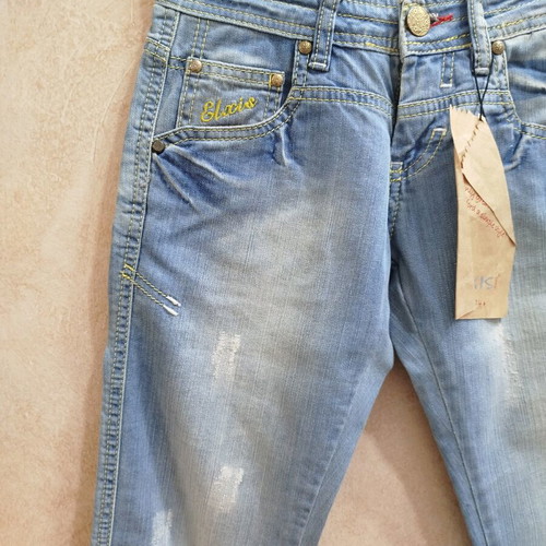 Jeans like new, low rise, light blue with yellow fading, slim fit
