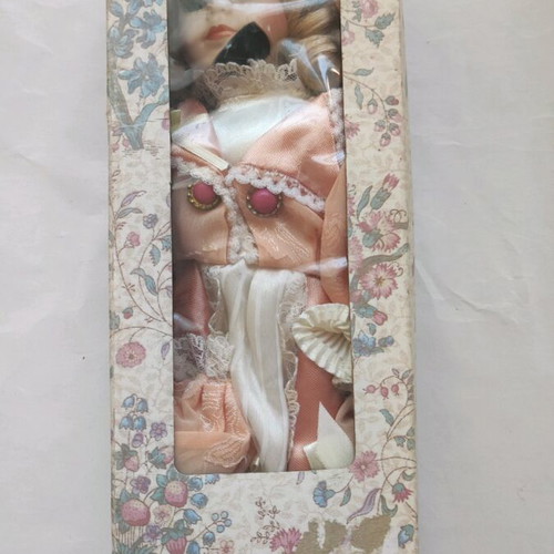 Porcelain dolls used, set of 2 with clothes and accessories