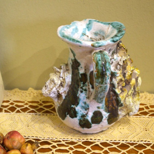Decorative vintage jug used with mascarons