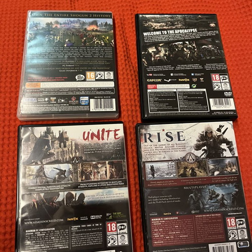 PC Games pack of 4 like new with Assassin's Creed, Total War Shogun 2, Dead Rising 3