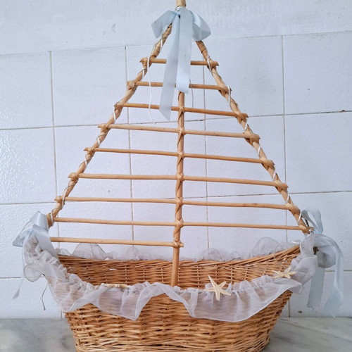 Large wicker basket in sailboat design used