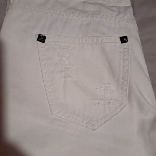 White slim denim pants like new with rips and straight fit