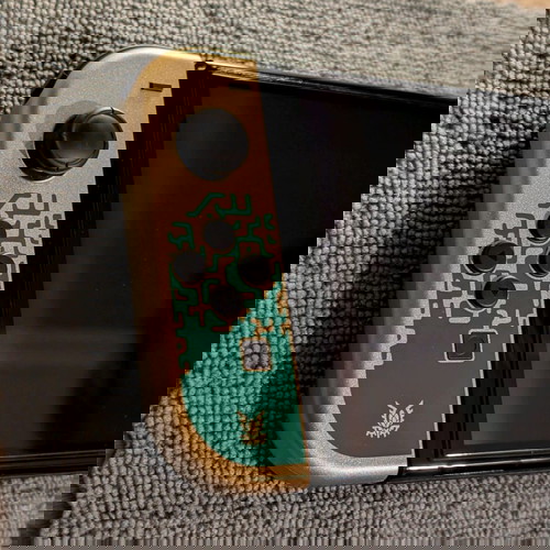 Nintendo Switch OLED Zelda Edition като нов с запечатани аксесоари