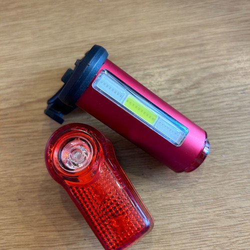 LED bicycle lights, one with 3 color modes