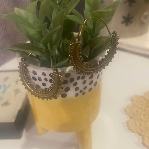Handmade earrings used, gold-colored hoop shape
