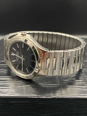 Caravelle by Bulova watch used, men's, black and silver