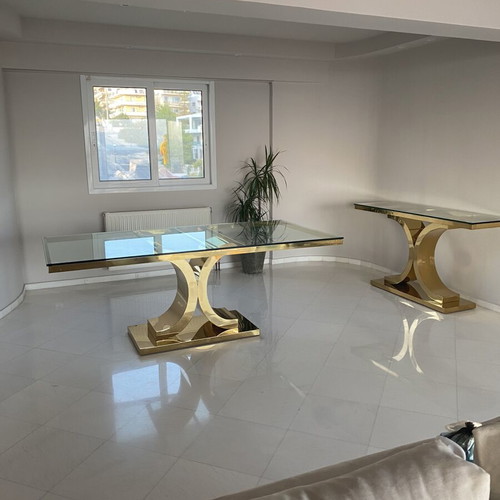Elegant custom-made dining room set with glass table and 8 chairs