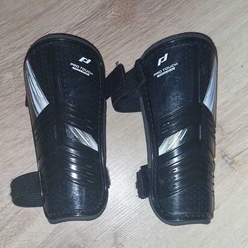 Pro Touch football set like new, shoes size 36 & shin guards XS