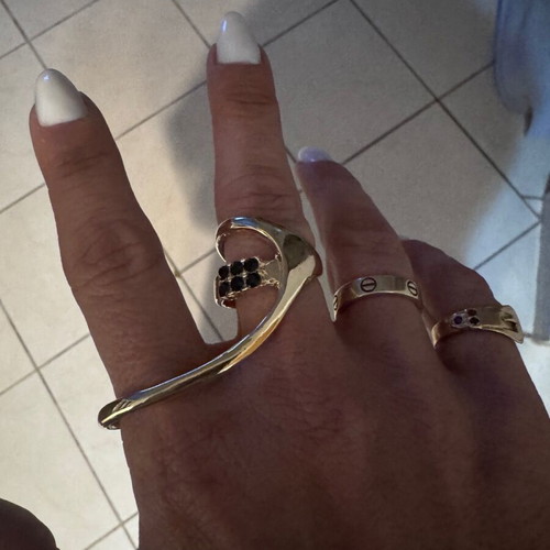 Serpenti style ring in gold stainless steel like new with black zircon stones