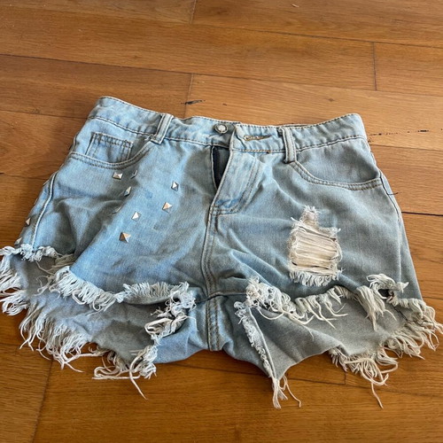 Shorts with fringes used, light blue rock style, size S