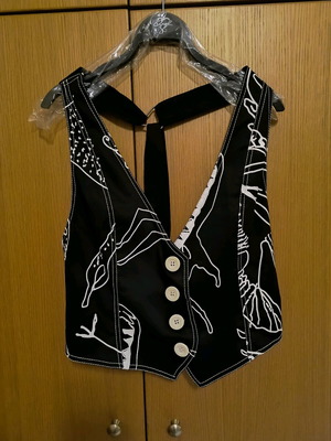 Reni Leza vest like new