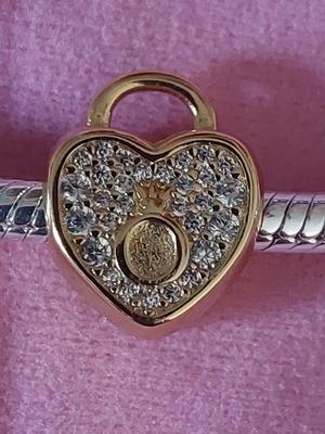 Charm stopper heart new, gold color with white zirconia and Pandora logo